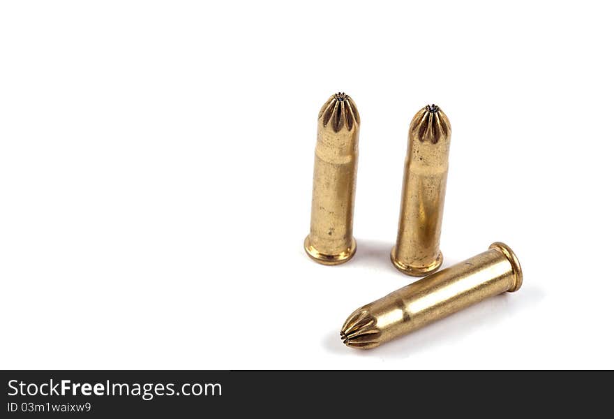 Studio shot of several 9mm hollow point bullets on white background. Studio shot of several 9mm hollow point bullets on white background