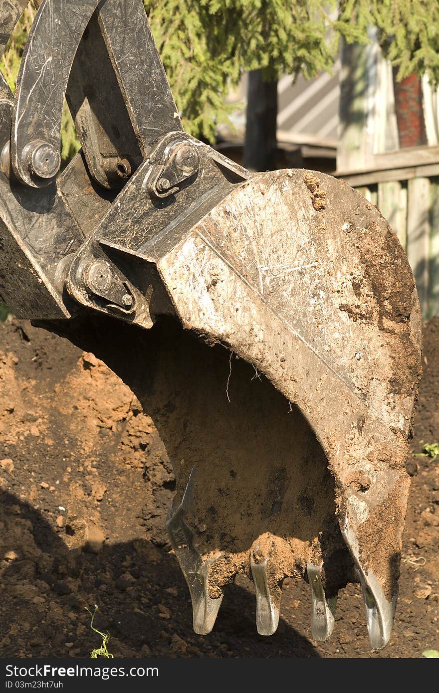 Excavator bucket mechanism