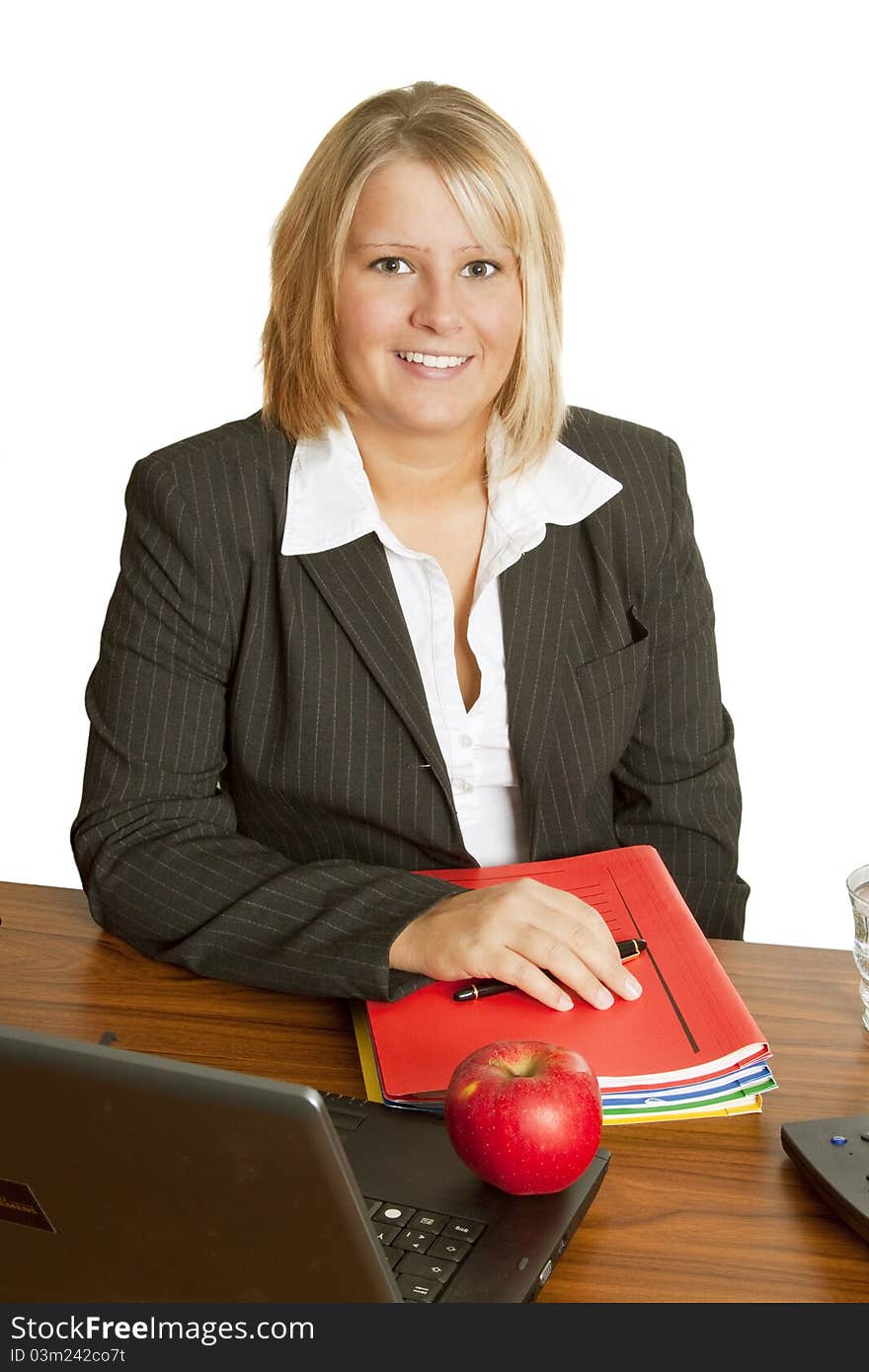 Young woman  in office workplace- on white background. Young woman  in office workplace- on white background