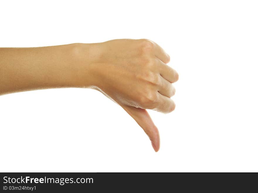 Close-up of girls hand thumb down. Isolated on white background. Close-up of girls hand thumb down. Isolated on white background