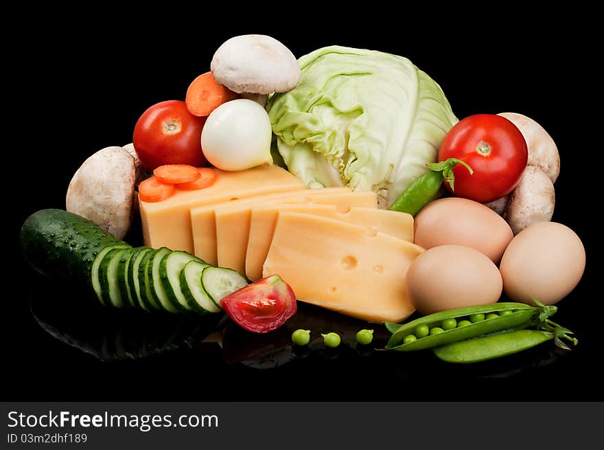 Fresh vegetables isolated on a black background