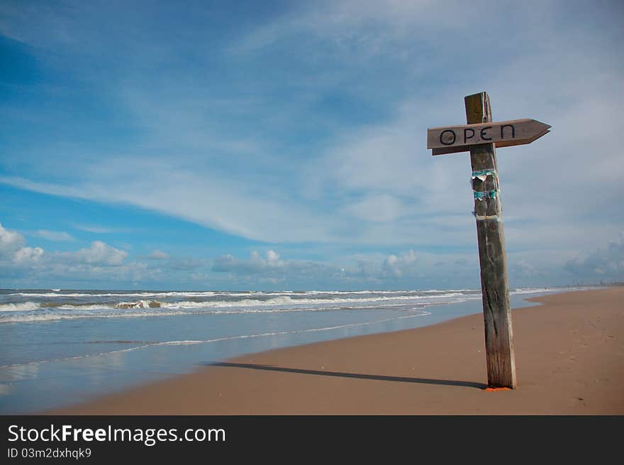 Open sign on the beach. Open sign on the beach