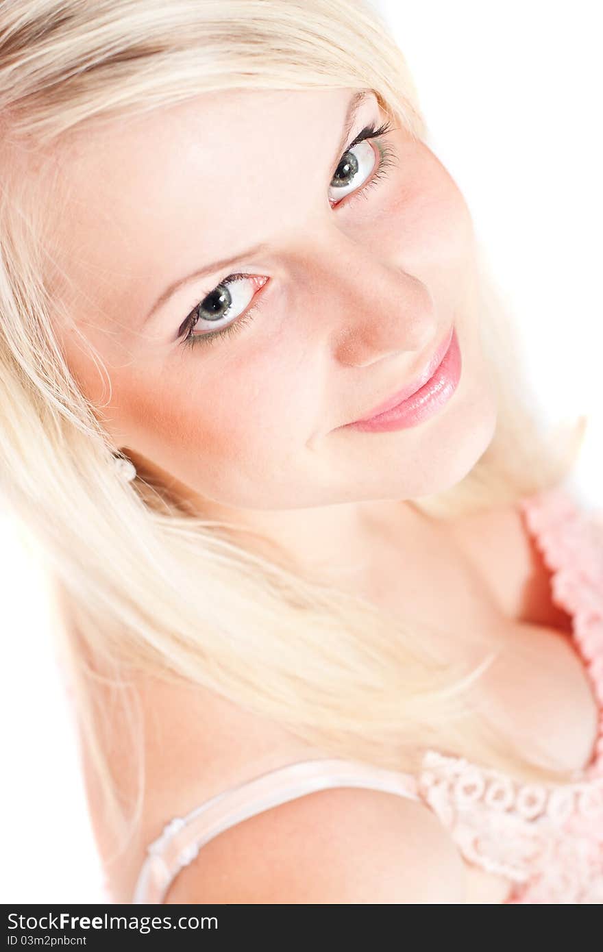 Close-up portrait of a beautiful blond girl