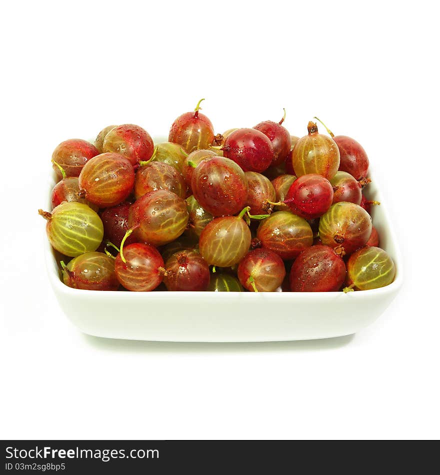 Sunny Gooseberry In A Plate In White Background