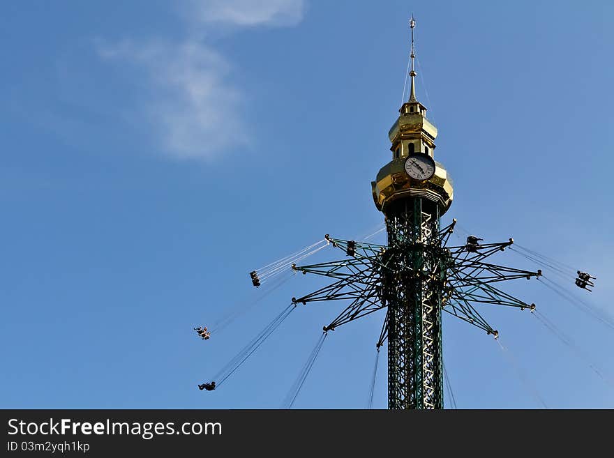 A carousel high up in the sky on a fair in Vienna