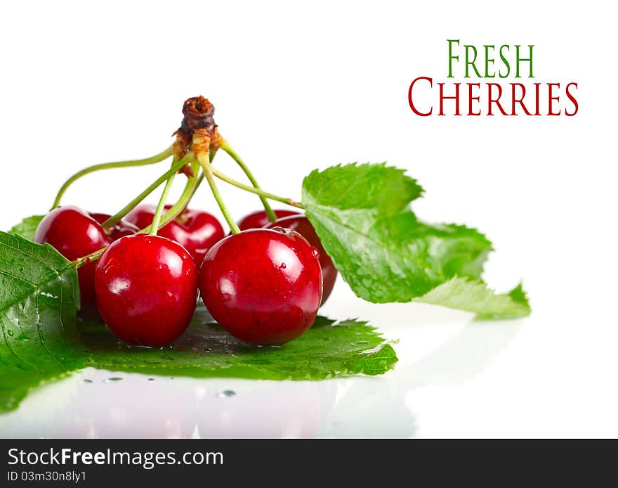 Fresh cherry berries with leaves