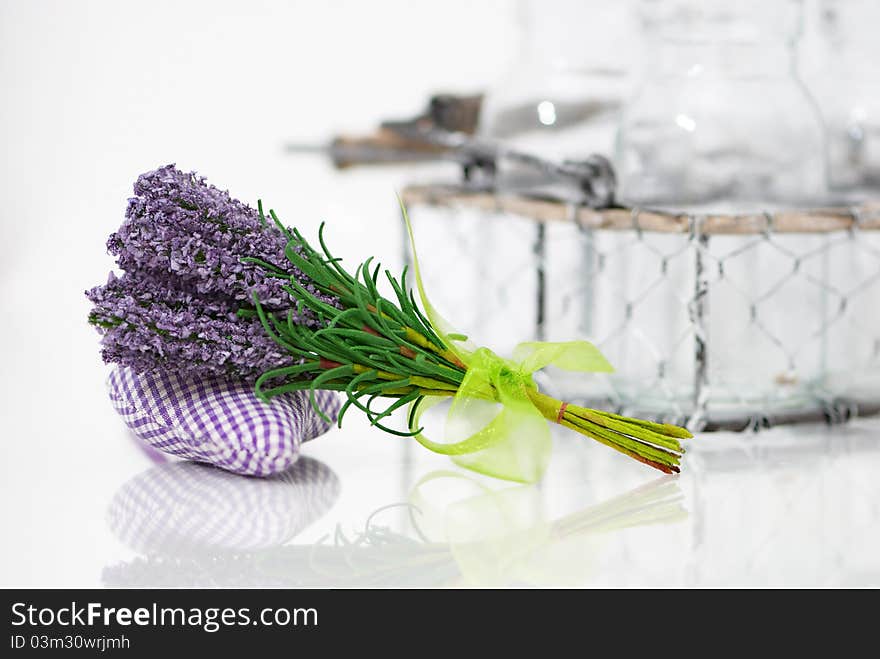 Bunch of lavender flower on an aromatic pillow with a reflection