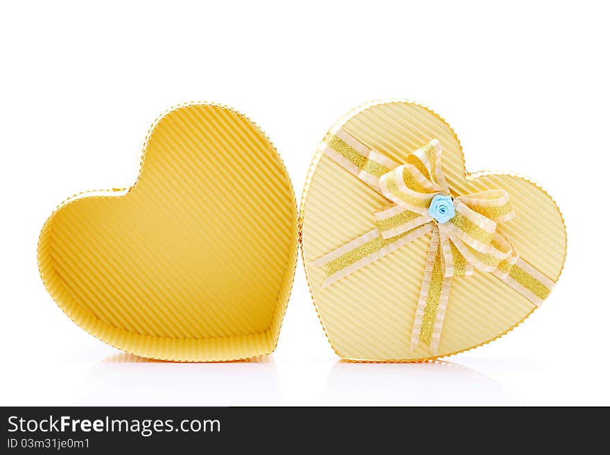 Heart shaped box with bow isolated on white background. Heart shaped box with bow isolated on white background