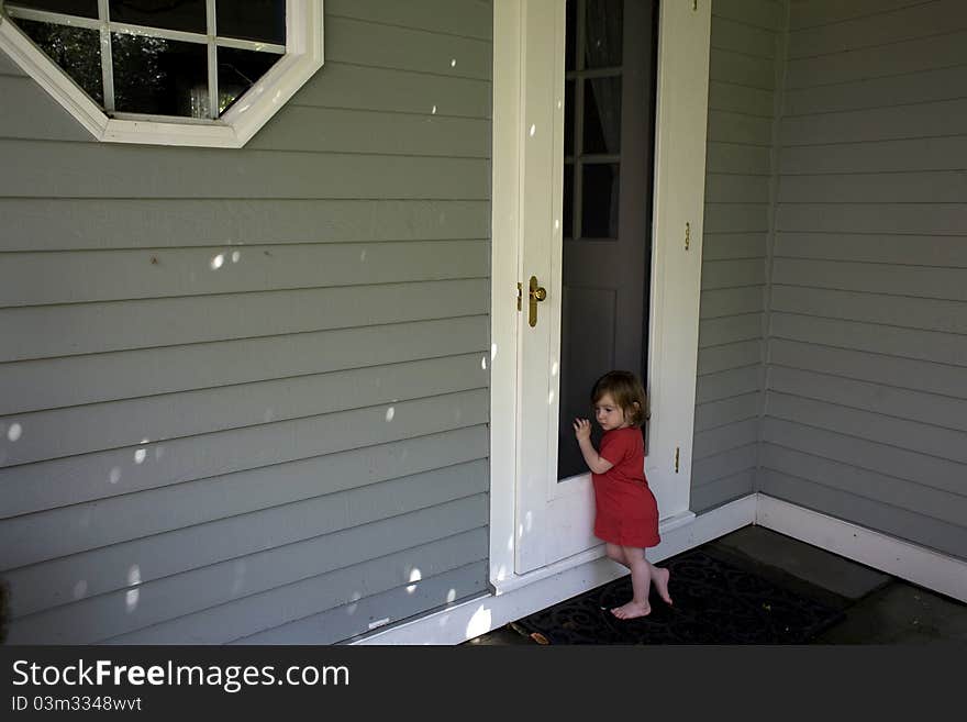 A young girl at her new home. A young girl at her new home