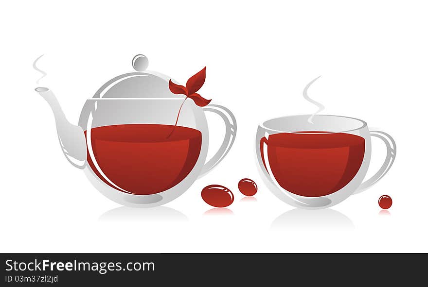 Glass teapot and a mug with strong tea, a tea leaf and sweets