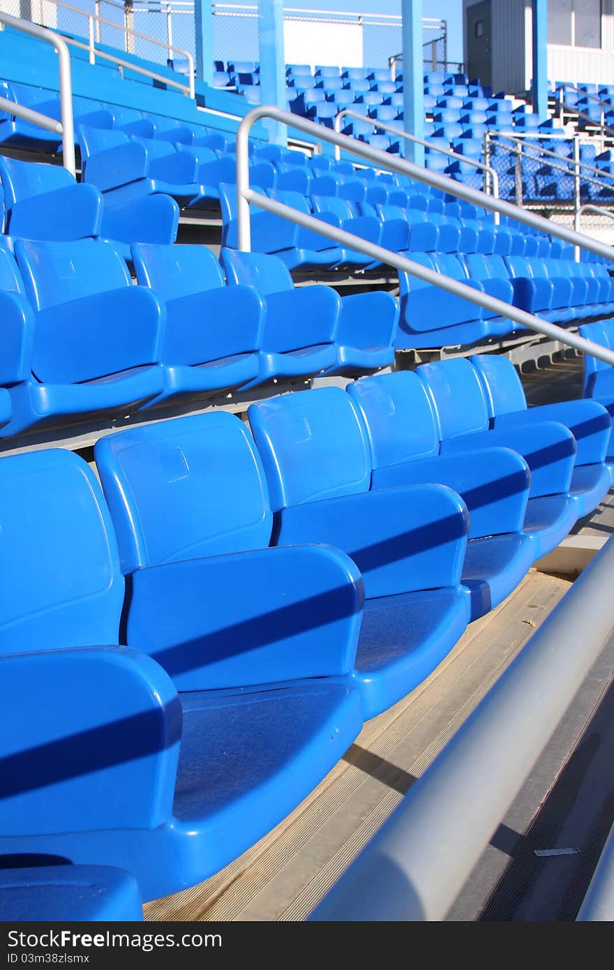 Empty blue stadium seats