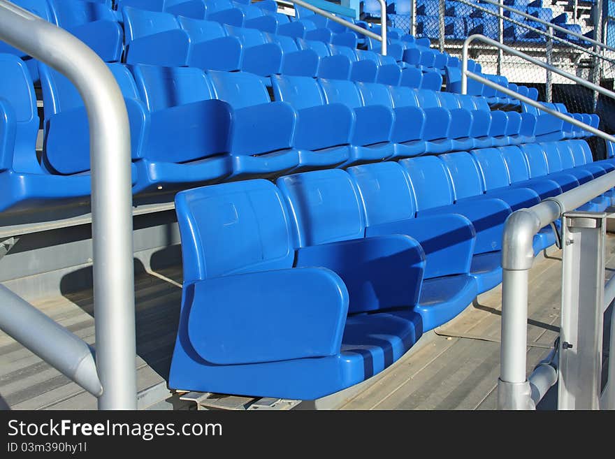 Blue empty stadium seats