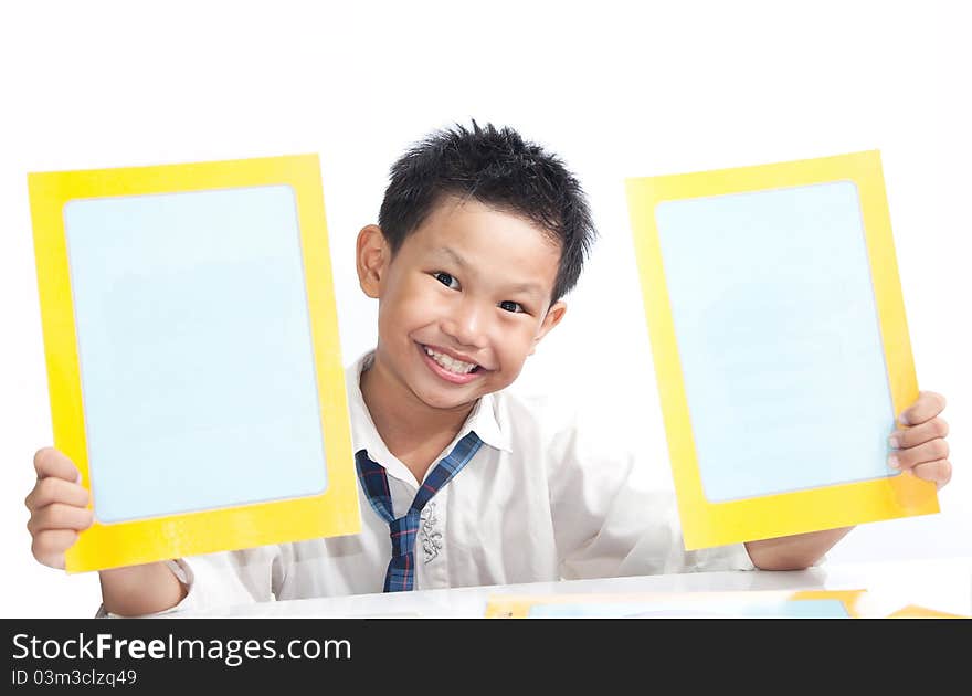 A Boy Holding Empty Cards On White Table