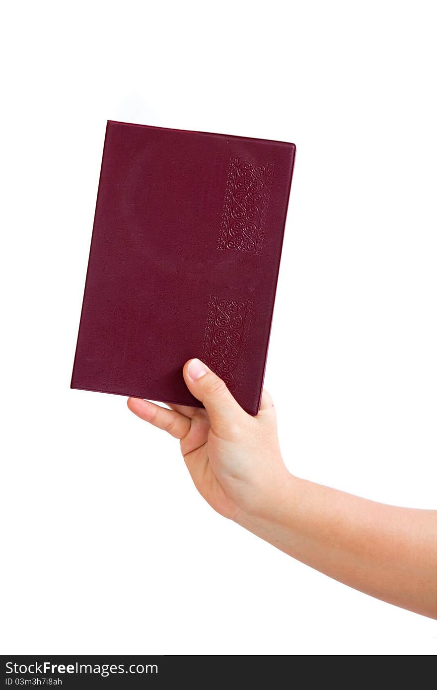 Notebook in hand on a white background