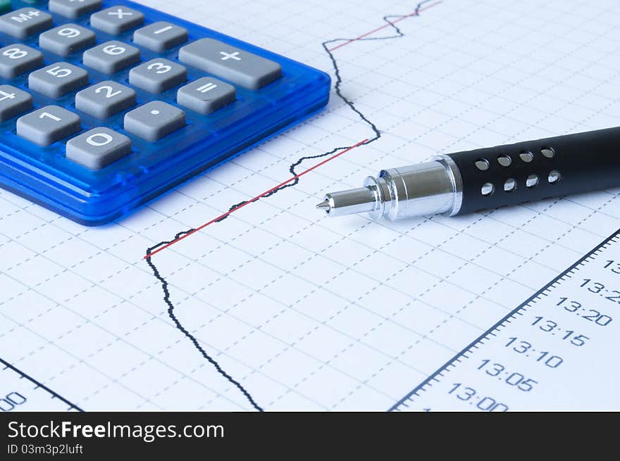 Pen drawing graph and notebook