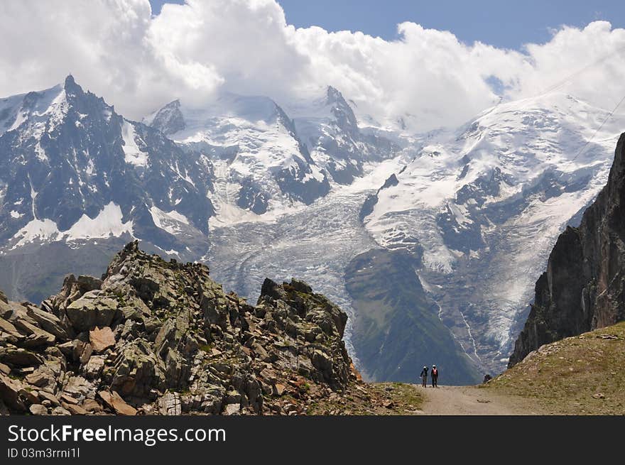 The expedition in the mountains overlooking the Mont Blanc. The expedition in the mountains overlooking the Mont Blanc