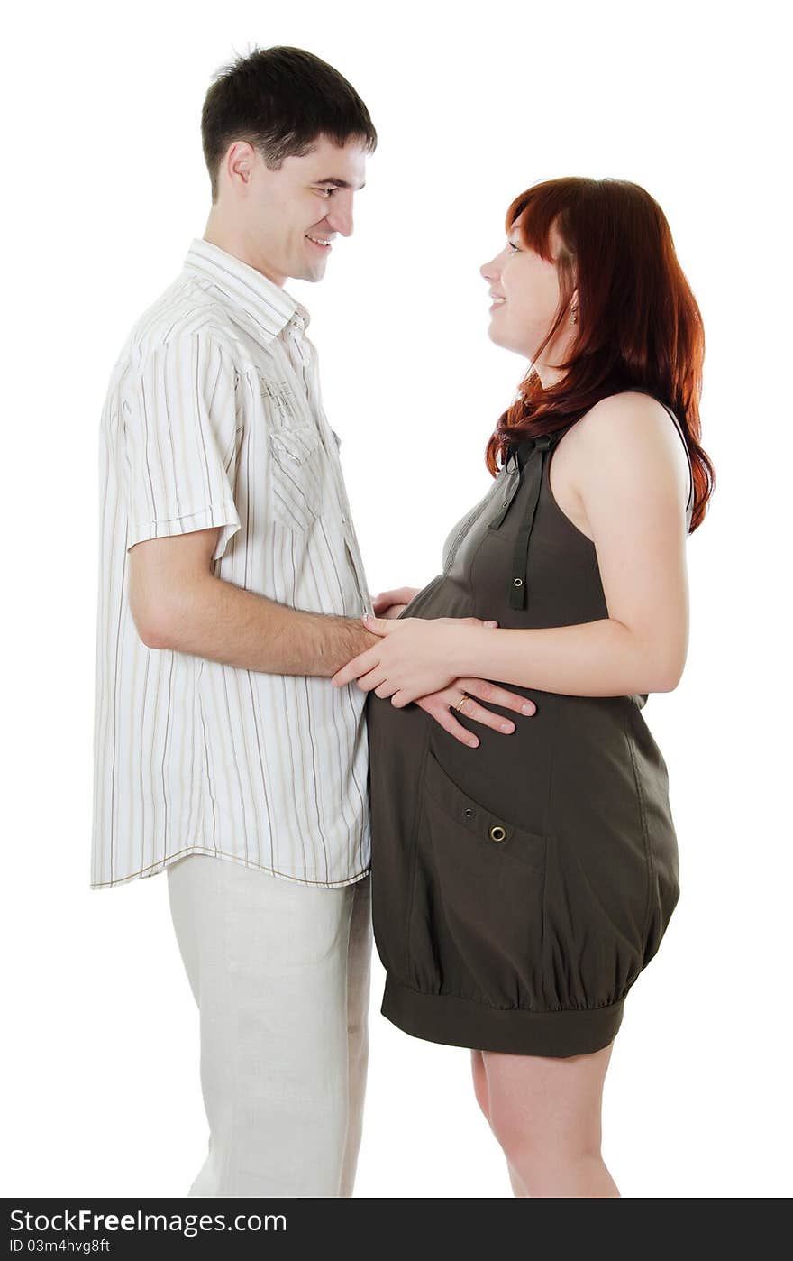 Happy pregnant couple on white background