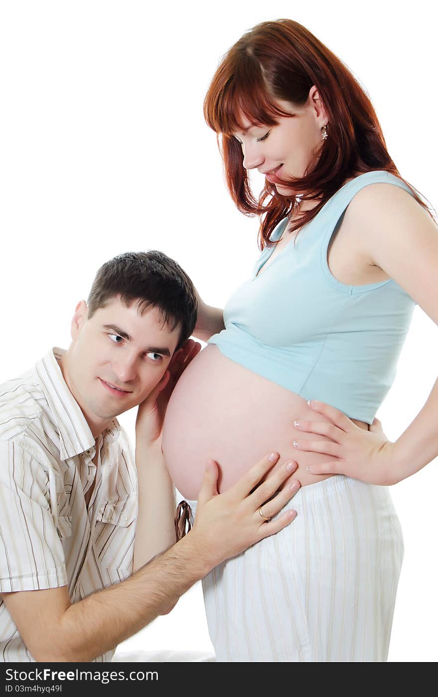 Happy pregnant couple isolated on white background