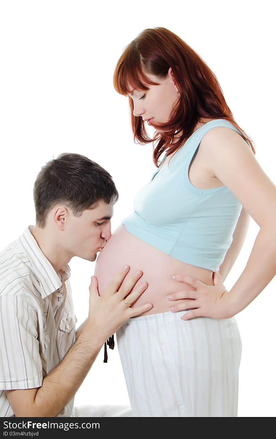 Happy pregnant couple isolated on white background