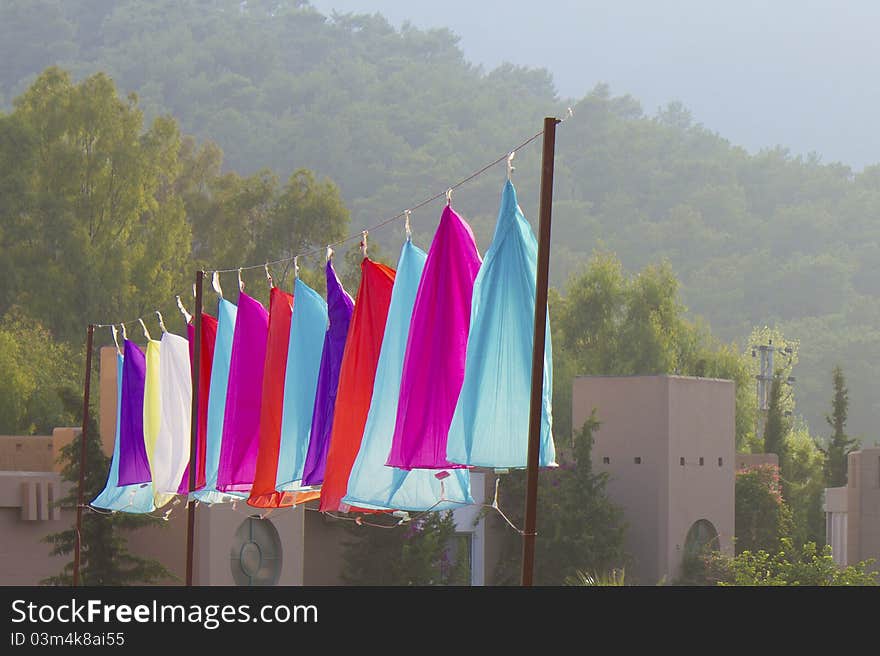 Multicolored Chinese lanterns on a rope outdoors