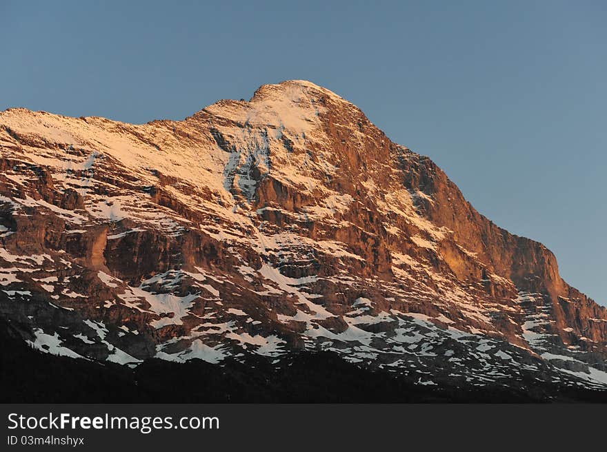 The Eiger is a mountain in the Swiss Alps in Grindelwald (Bernese Oberland) with a high of 3970 m. The first ascent of the Eiger was made by Swiss guides Christian Almer and Peter Bohren and Irishman Charles Barrington who climbed the west flank on August 11.1858. The first ascent of the north face was made 1938 by Anderl Heckmair and Ludwig Vörg from Austria and the Germans Heinrich Harrer and Fritz Kasparek. The Eiger is a mountain in the Swiss Alps in Grindelwald (Bernese Oberland) with a high of 3970 m. The first ascent of the Eiger was made by Swiss guides Christian Almer and Peter Bohren and Irishman Charles Barrington who climbed the west flank on August 11.1858. The first ascent of the north face was made 1938 by Anderl Heckmair and Ludwig Vörg from Austria and the Germans Heinrich Harrer and Fritz Kasparek.