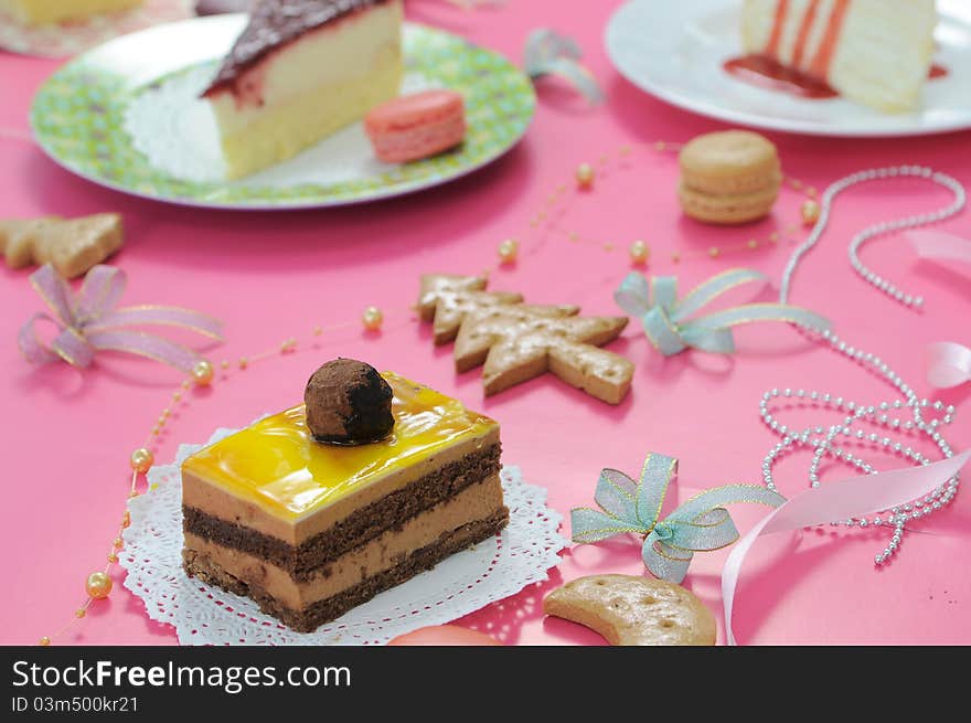 Colorful dessert party with many cakes.