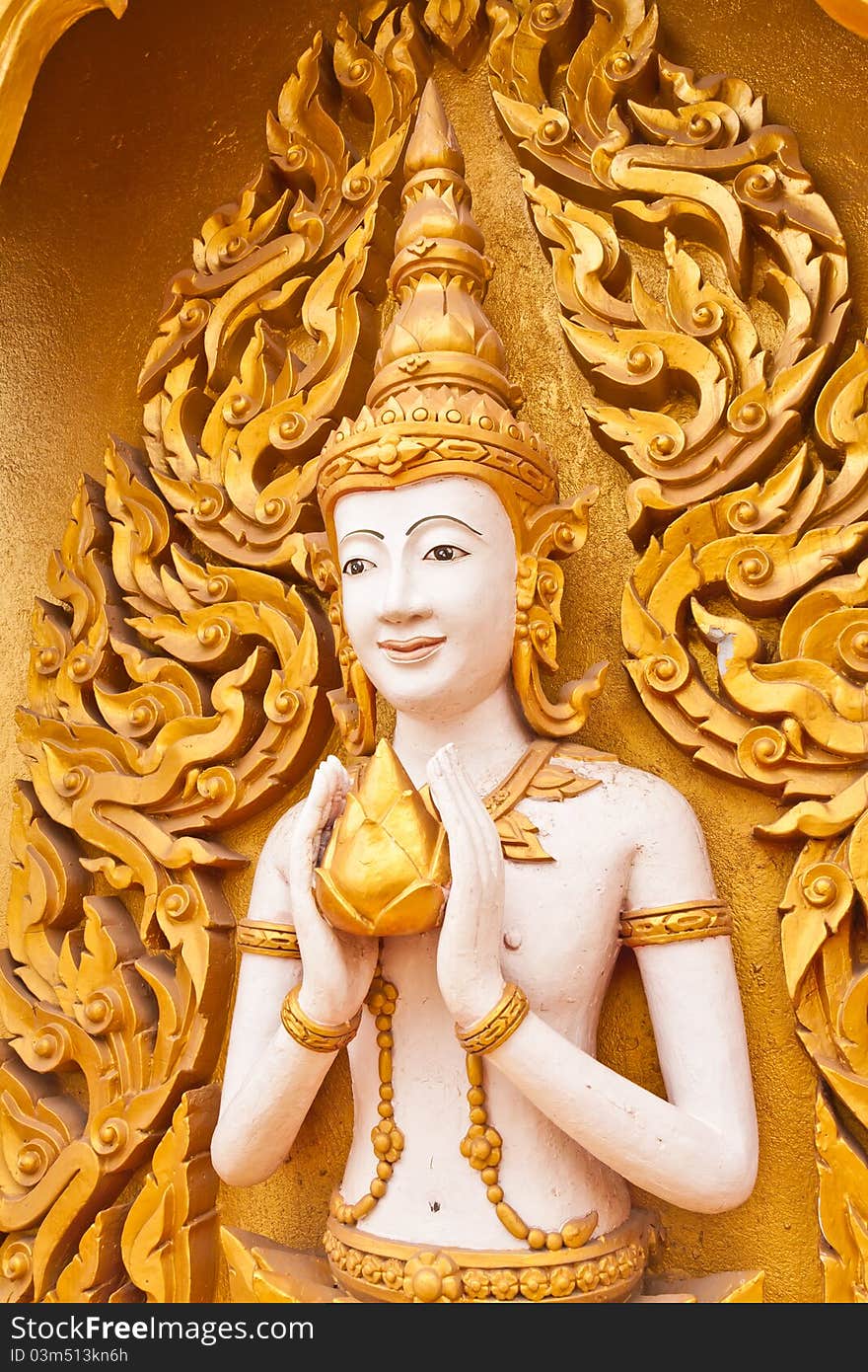 Angel decoration of buddhist temple tilted out