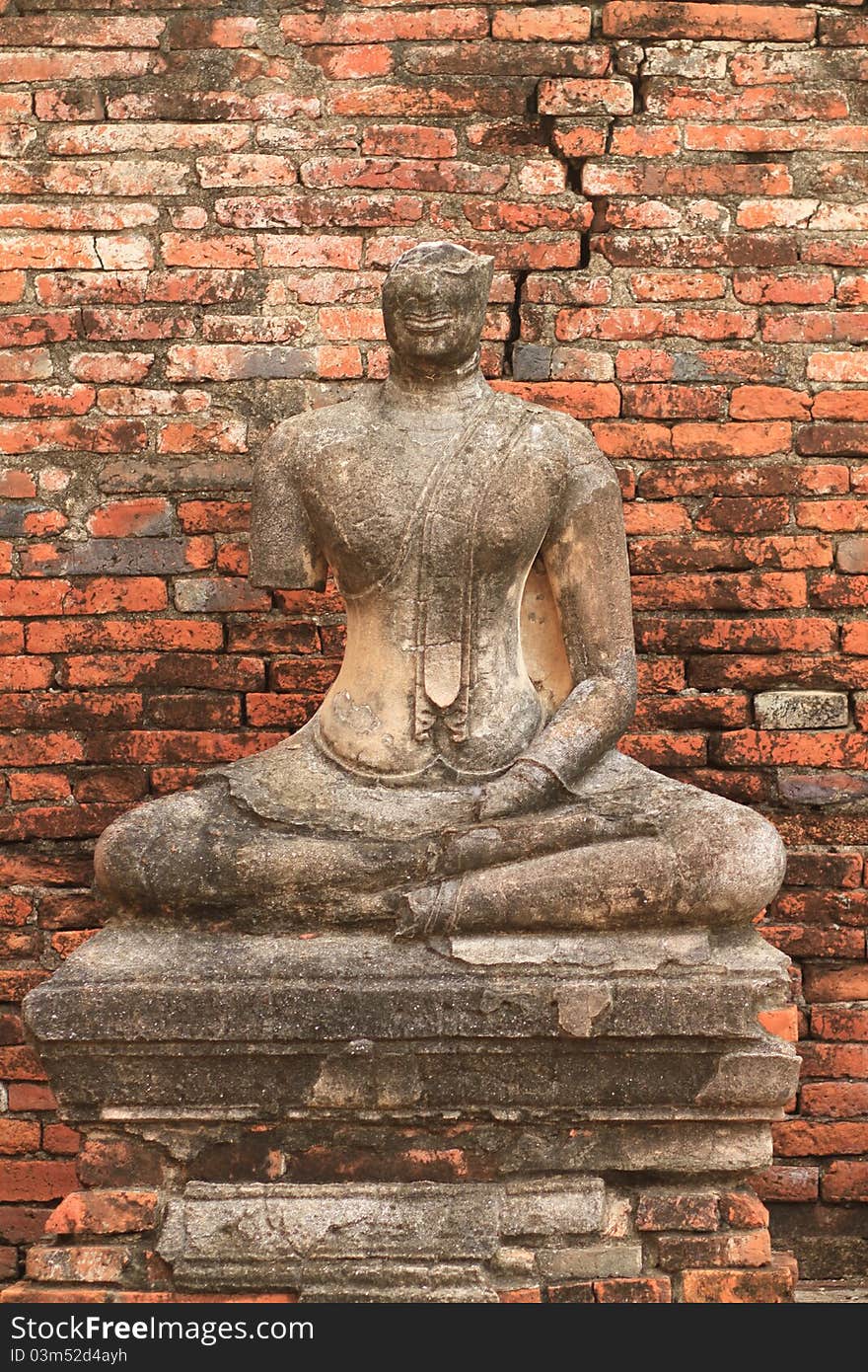 Ruined statue of buddha at Wat Chaiwattanaram, Ayuthaya, Thailand. Ruined statue of buddha at Wat Chaiwattanaram, Ayuthaya, Thailand.