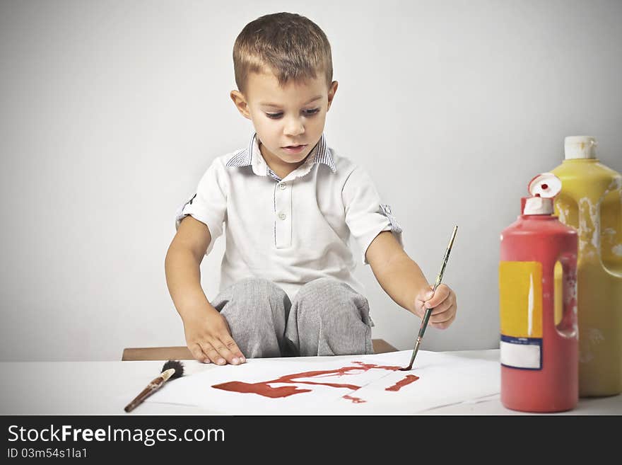 Portrait of a child painting. Portrait of a child painting