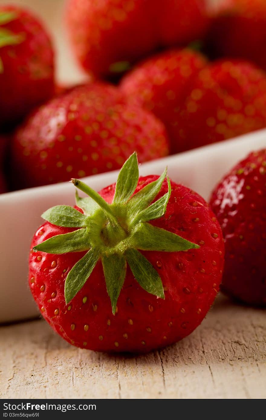 Strawberries on wooden table