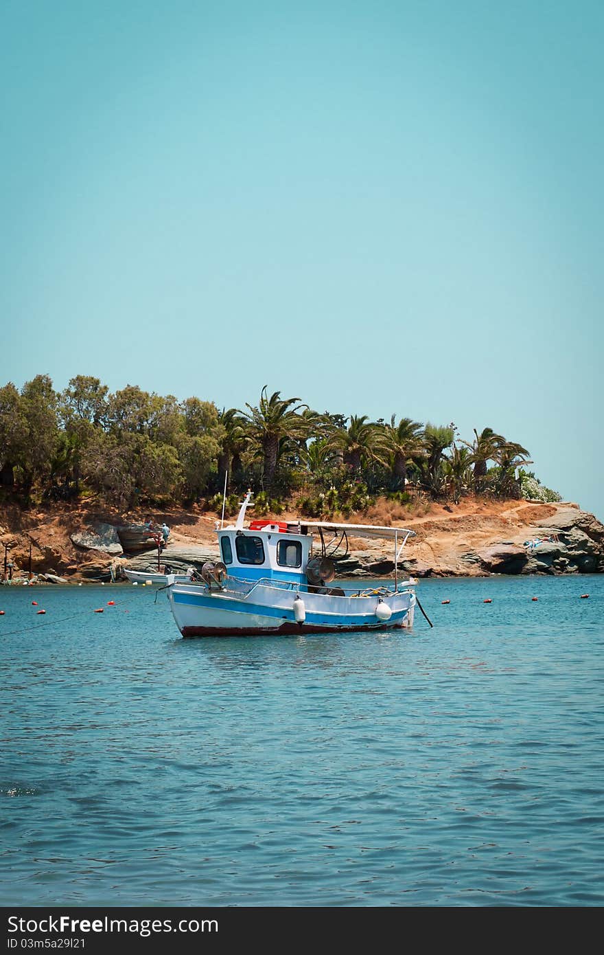 Fishing Boat Near The Coast Of The Sea