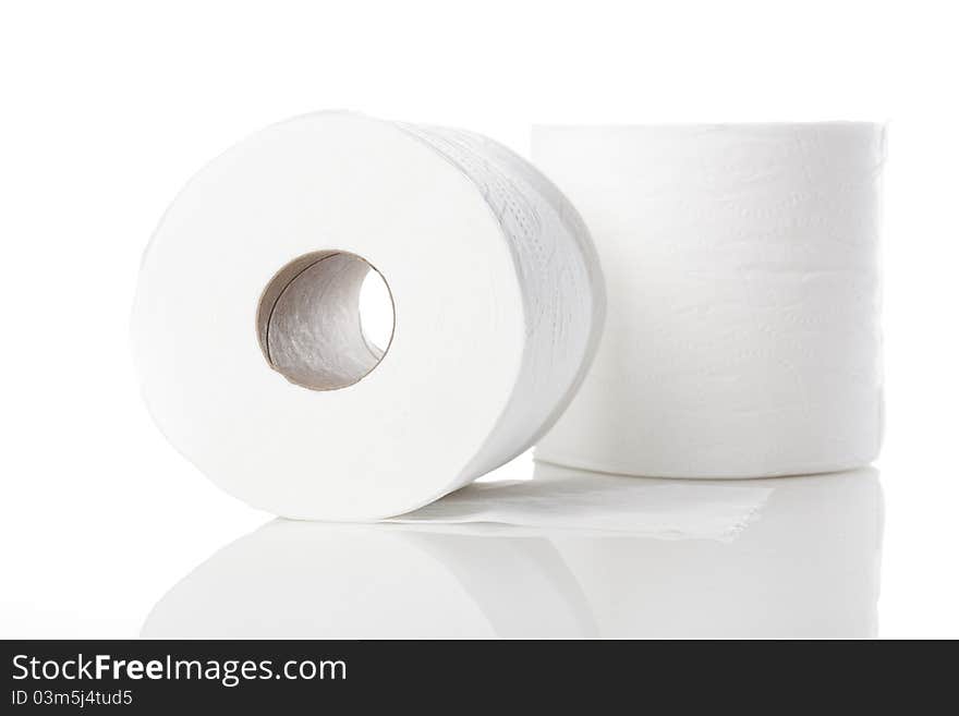 Clean white toilet paper against a white background