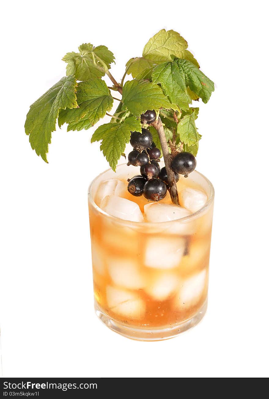 The branch of a currant costs in a glass with tea. The branch of a currant costs in a glass with tea