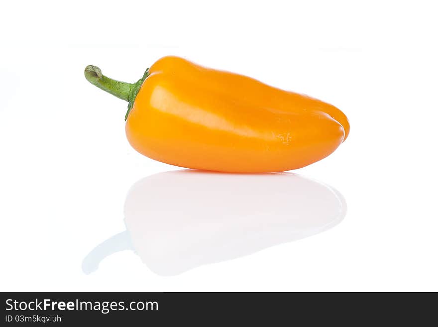 An orange baby pepper