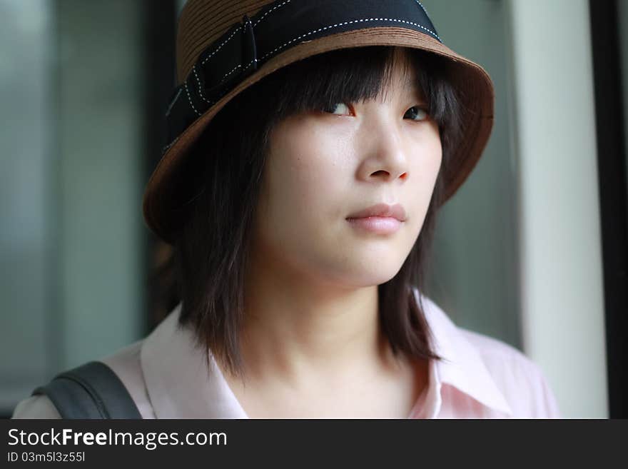 Closeup of lovely girl with hat