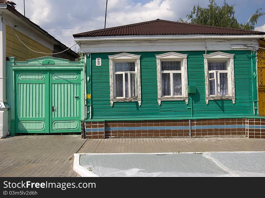 Restored wooden house and fence in the town of Kolomna. Restored wooden house and fence in the town of Kolomna.