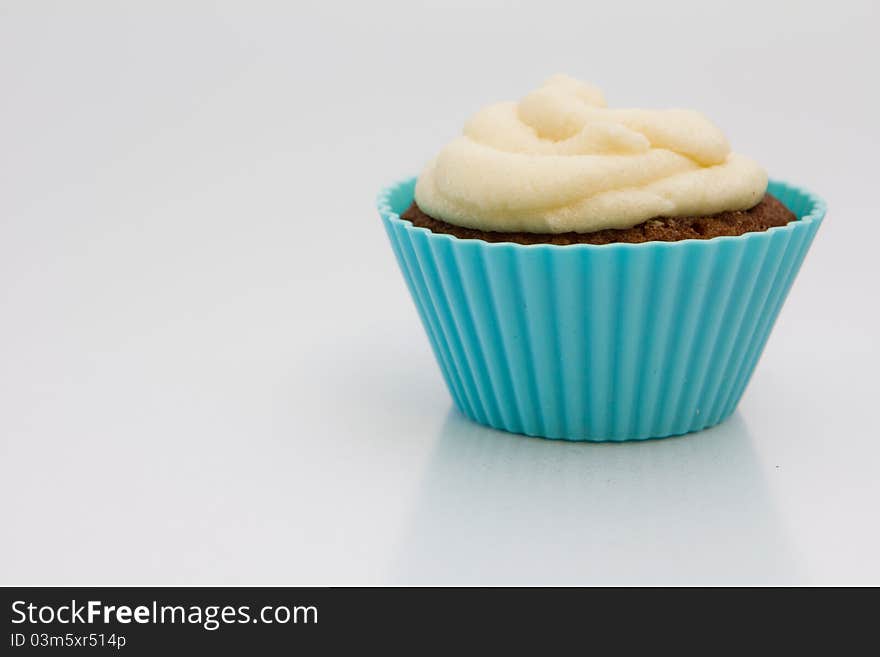 Muffin with cream on top