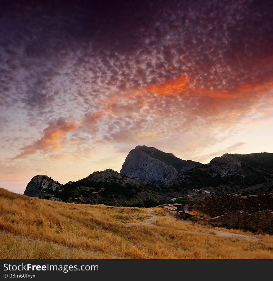 Landscape with the cloudy sky at the end of day. Landscape with the cloudy sky at the end of day