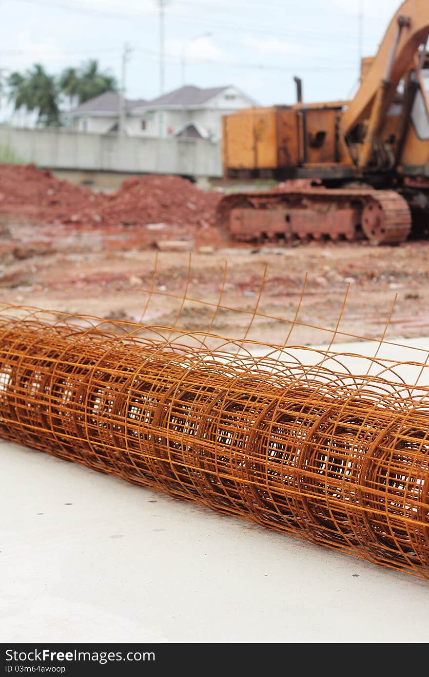 Excavator car and steel bars