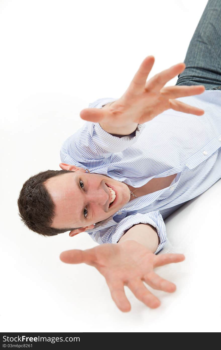 Fun cheerful young man isolated on a white background