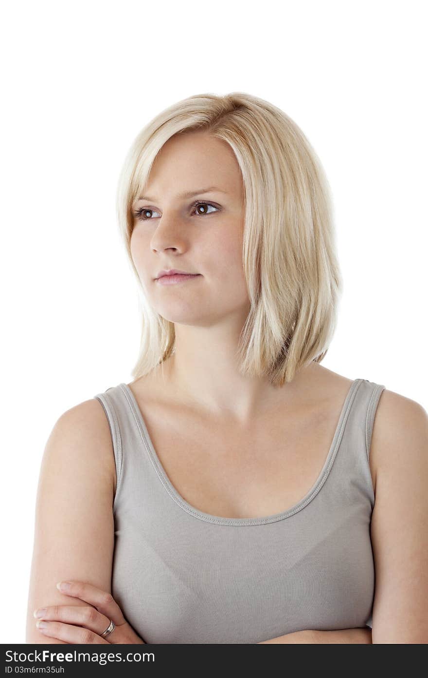 Portrait of a an attractive blonde woman with crossed arms.Isolated on white background. Portrait of a an attractive blonde woman with crossed arms.Isolated on white background.