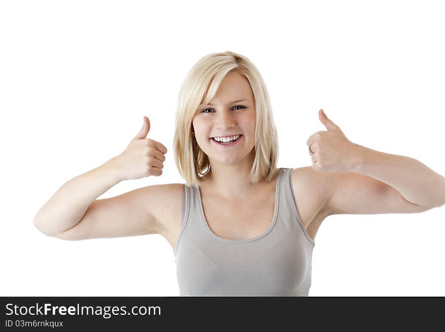 Beautiful blond woman holds both thumbs up and smiles.Isolated on white background.