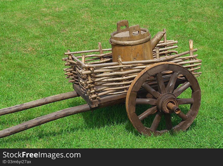 Country wagon with a barrel, which serves to transport water. Country wagon with a barrel, which serves to transport water