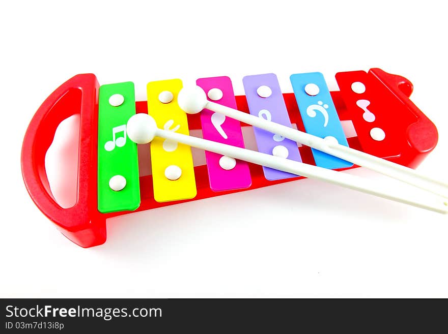 Toy colorful xylophone on white background