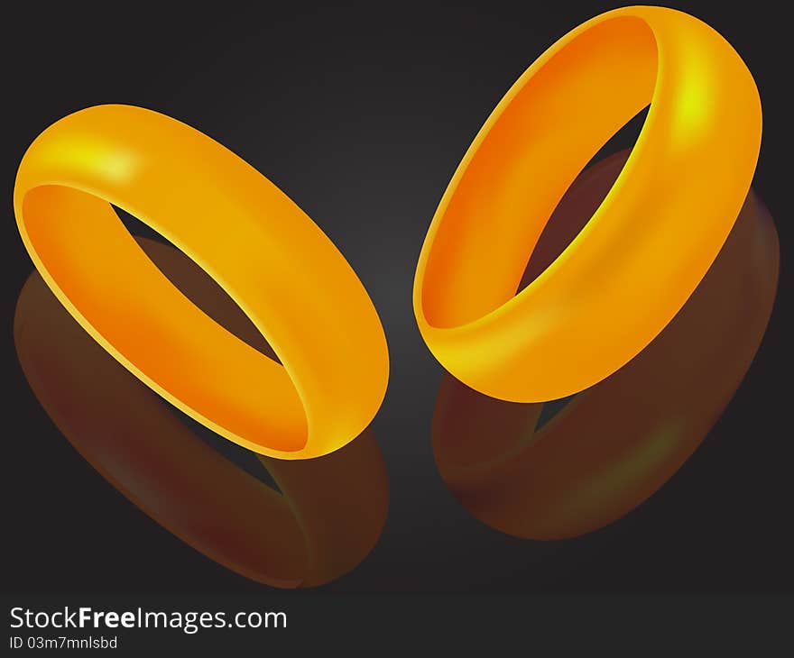 Wedding rings a symbol of love on a background with reflection in a