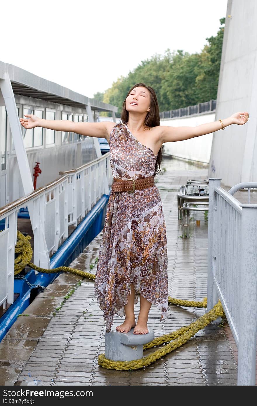 girl standing on embankment. girl standing on embankment