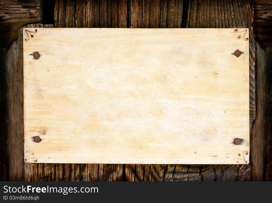 Blank frame on wooden texture