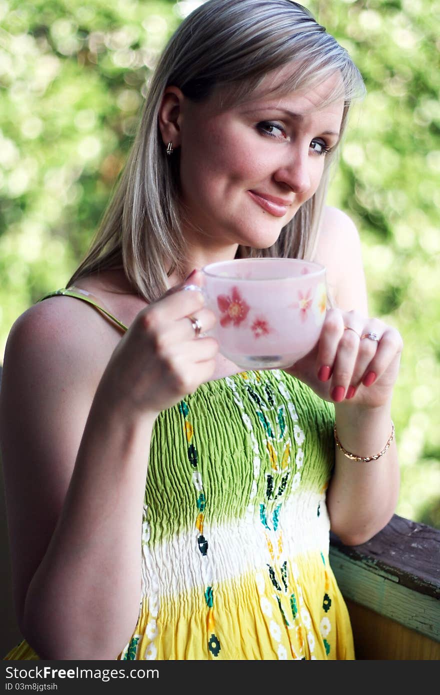 Woman Drinks Coffee Or Tea