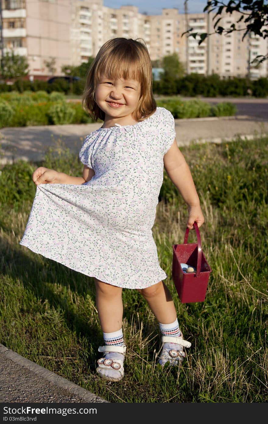 Portrait of blonde little girl outdoors in summer. Portrait of blonde little girl outdoors in summer