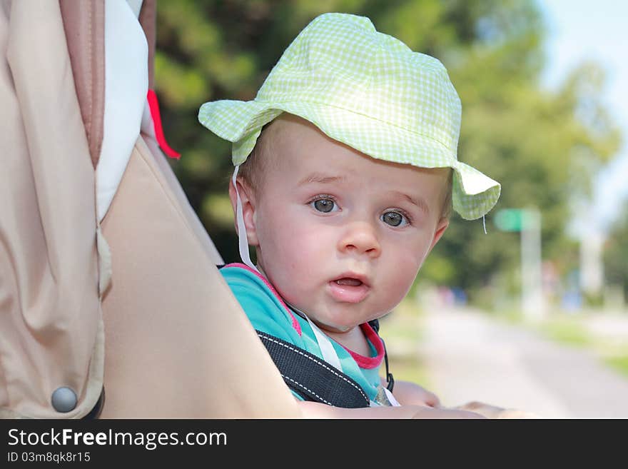 Baby Boy With Hat In Stroller